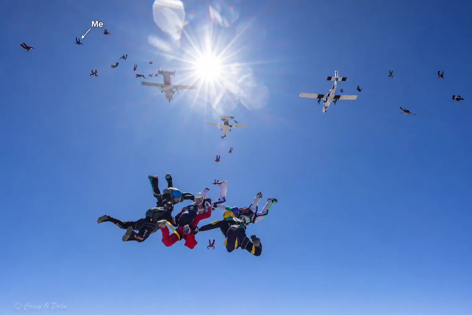 A freefall formation beneath the sun